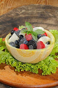 Galia melon, cantaloupe, raspberries, blackberries, blueberries