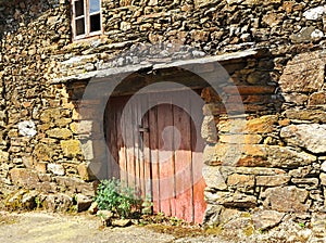 Galician rural architecture, stone house in the village of As Eiras, Orense province, Spain photo