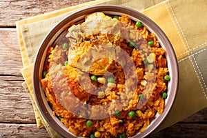 Galinhada is the Brazilian version of arroz con pollo chicken an photo