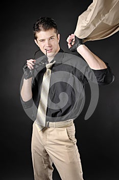 Gallant man wearing a white classic suit. photo