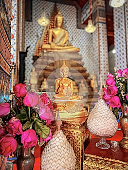 Gallery with old vessels of the seated Buddha in the Buddhist temple Wat Arun. Bangkok, Thailand