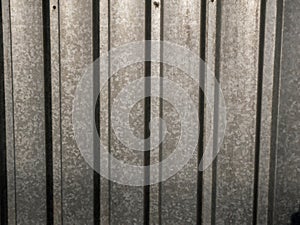 Galvanised sheet steel garden fence close up shot