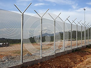 Galvanized iron anti-theft security fencing.