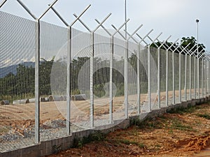 Galvanized iron anti-theft security fencing.