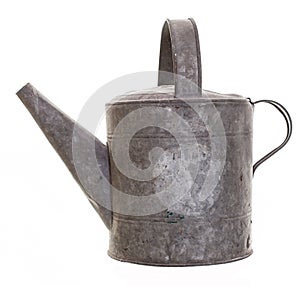 Galvanized metal vintage watering can isolated photo