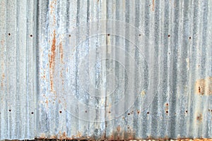 GalvanizedZinc sheet was seized together with an old rusty nail