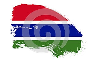 Gambia flag on white background with abstract paint brush texture effect