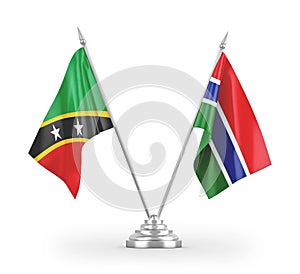 Gambia and Saint Kitts and Nevis table flags isolated on white 3D rendering