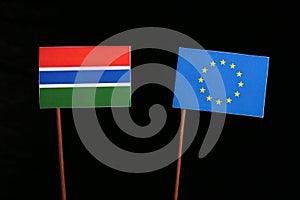 Gambian flag with European Union EU flag isolated on black