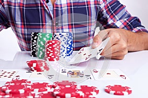Gambler shows winner poker hand