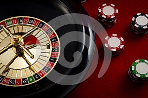 Gambling, casino games and the gaming industry concept with twenty one the winning number, 21 is a red number on the roulette photo