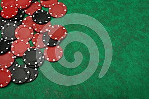 Gambling chips over green felt