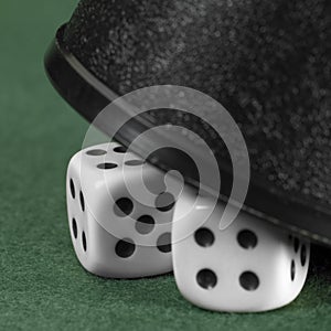 Gambling tension with hidden dice