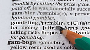 Gambling, word meaning in vocabulary, illegal business, playing in casino, risk