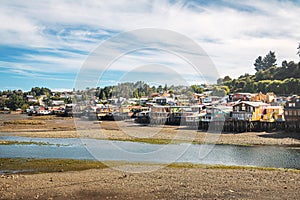 Gamboa Palafitos Stilt Houses at low tide - Castro, Chiloe Island, Chile