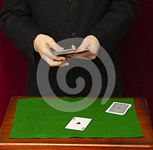 game of cards on green placket