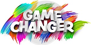 Game changer paper word sign with colorful spectrum paint brush strokes over white