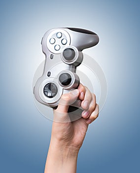 Game controller in hand raised up