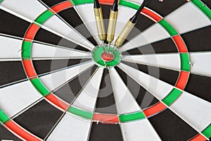 A game of darts with three flags of England on a white background