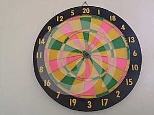 Game of darts on the wall