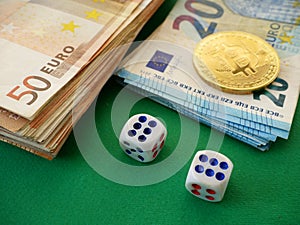 Game dice with bitcoin coin and euro money cash on green background, Online gambling with cryptocurrency and cash concept, closeup