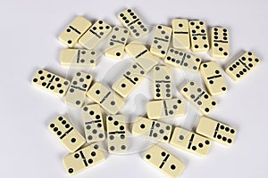 A game of dominoes on a light background. Close-up. Selective focus