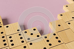 A game of dominoes on a light background. Close-up. Selective focus