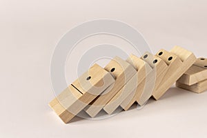 A game of dominoes on a light background. Close-up. Selective focus