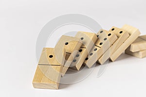 A game of dominoes on a light background. Close-up. Selective focus