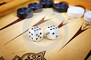 Game field in a backgammon with cubes and counters.