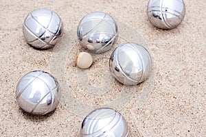 Game of jeu de boule, silver metal balls in sand
