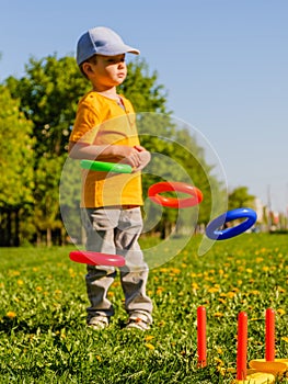 Game kid boy fun grass. green