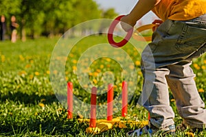 Game kid boy fun grass. throw