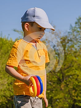 Game kid boy fun grass. toss