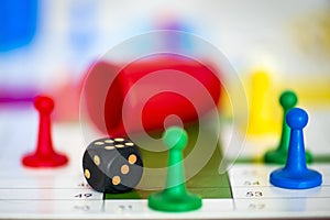 Game ludo close-up of black dice photo