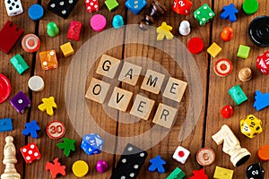 `Game Over` spelled out in wooden letter tiles