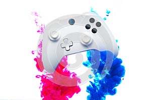 Game stick with pink and blue smoke on blank white background