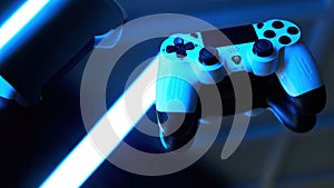 Gamepad on abstract background with light effects