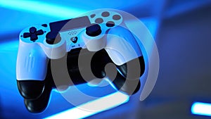 Gamepad on abstract background with light effects