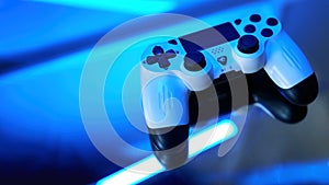 Gamepad on abstract background with light effects