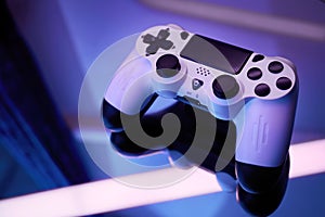 Gamepad on abstract background with light effects