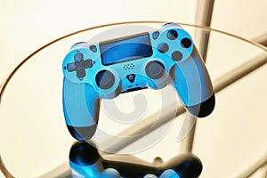 Gamepad on abstract background with light effects