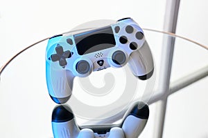 Gamepad on abstract background with light effects