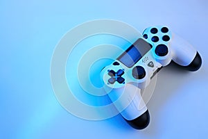 Gamepad on abstract background with light effects