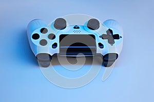 Gamepad on abstract background with light effects