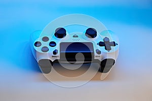 Gamepad on abstract background with light effects