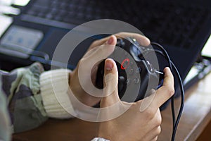 Gamepad for computer games in the hands