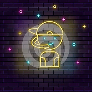 Gamer boy retro arcade neon on wall. Dark background brick wall neon icon