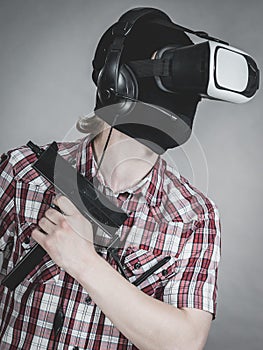 Gamer man wearing VR