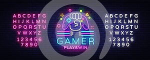 Gamer Play Win logo neon sign Vector logo design template. Game night logo in neon style, gamepad in hand, modern trend photo